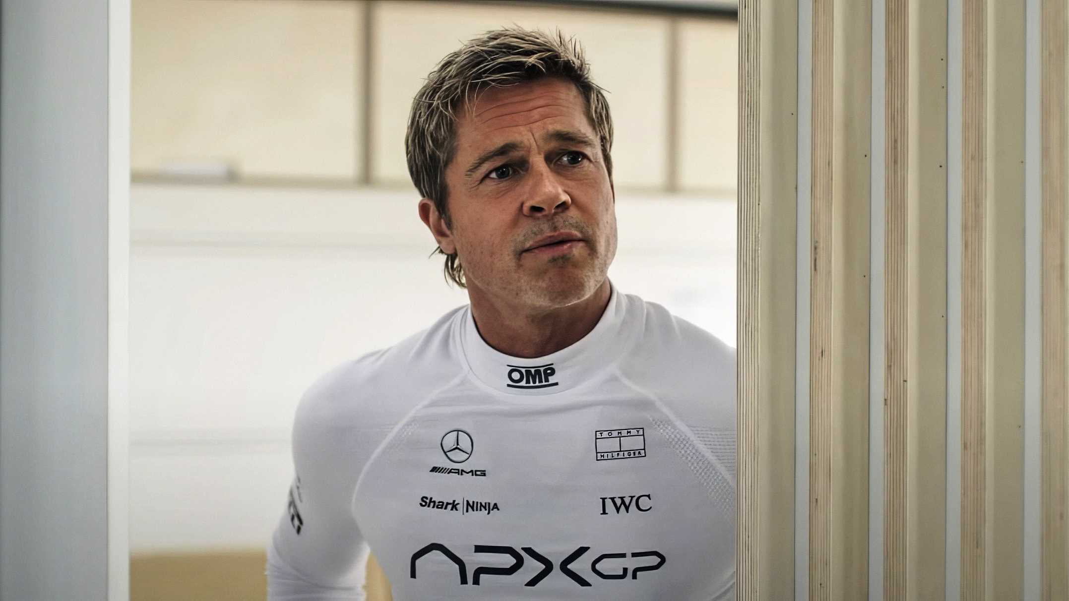 brad pitt peeking around a doorframe in f1 fz