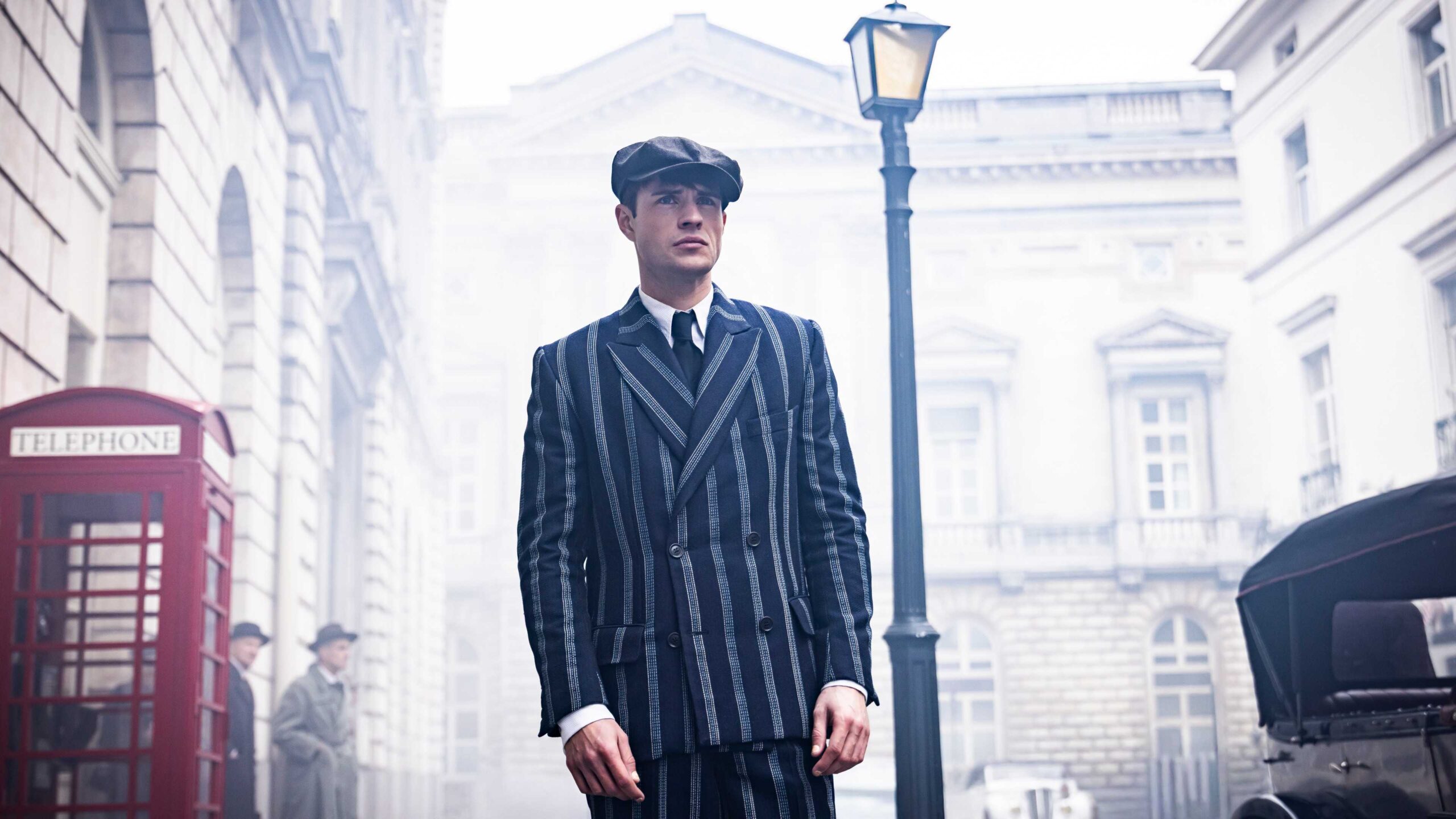 connor finch as jack blunt wearing a striped suit in 1946 london in bookish season 2 scaled 1