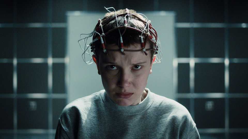 eleven with cables all over her head in stranger things season 4