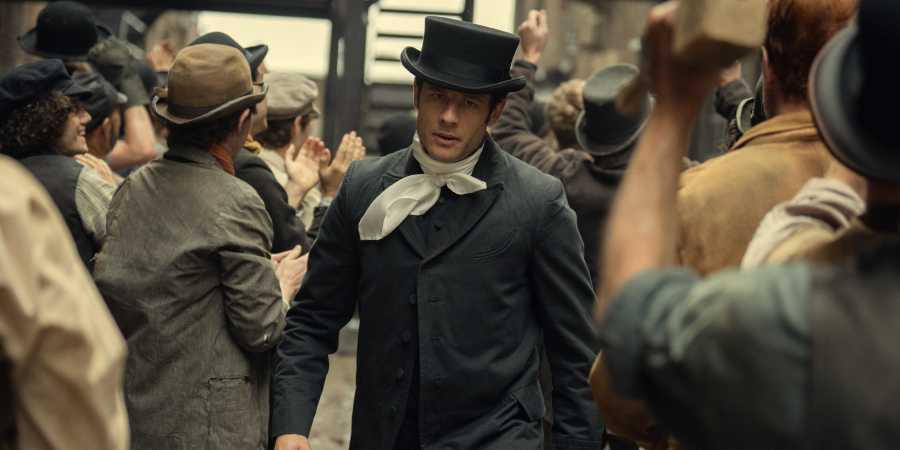 james norton as sean rafferty walking through a crowd in house of guinness