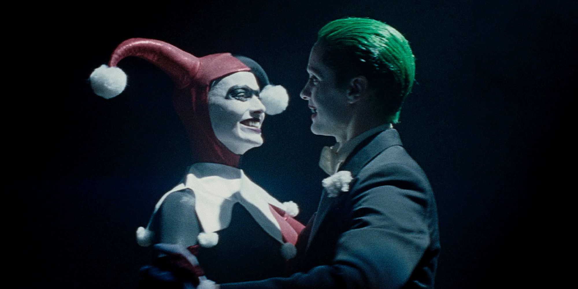 margot robbie s harley quinn and jared leto s joker dance wearing their classic costumes in suicide squad 1