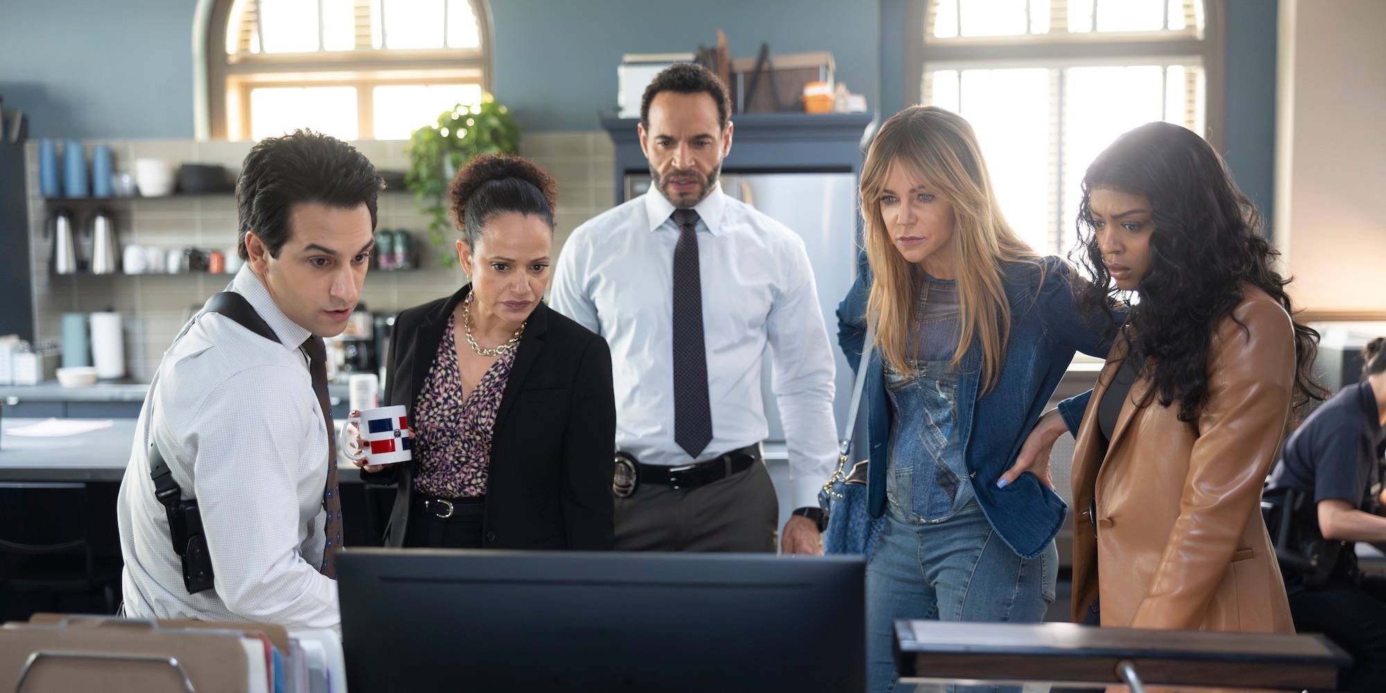 the detectives and morgan stand around a computer screen on high potential